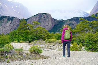 Day Hiking (woman hiking up Rio Electrico El Chalten)